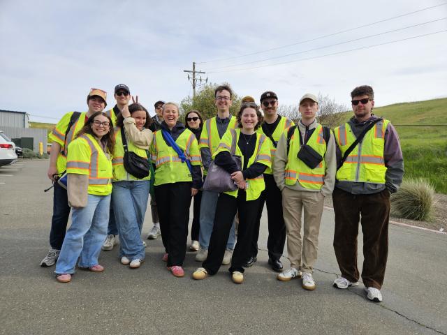 AAU students posing for picture at YOLO landfill